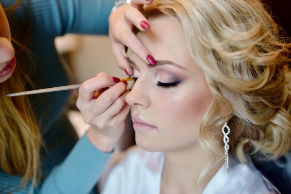 wedding-makeup-artist-making-a-make-up-for-bride.jpg